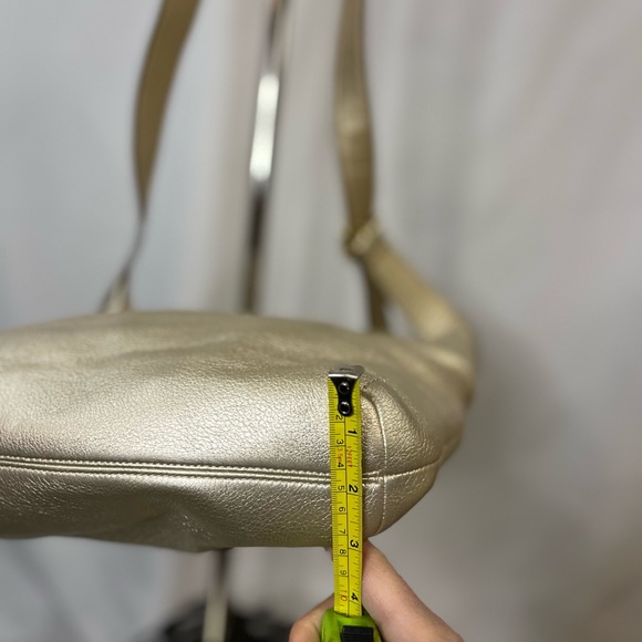 Coach gold crossbody bag.  Adjustable strap. - Picture 8 of 12